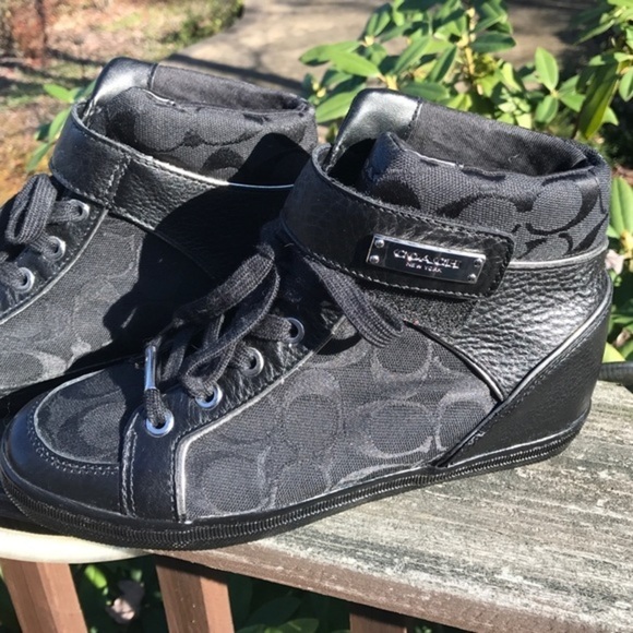 Brand new Coach elevated heel shoes